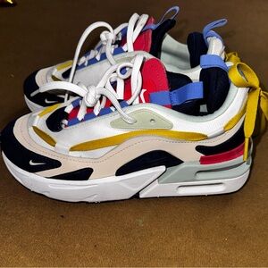 Nike Kids Sneakers in Red, Yellow, and Blue